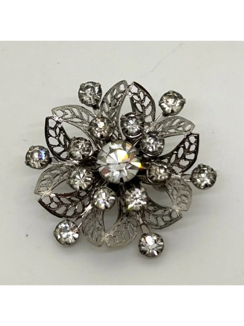 Vintage Silver Tone Rhinestone Brooch Pin Clear Crystal Floral Filigree Mid Cent